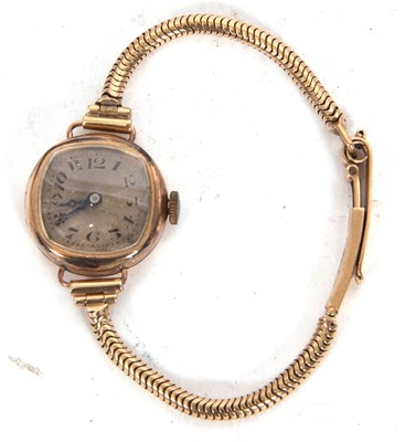 Lot 229 - A 9ct gold cased lady's wristwatch on a 9ct...