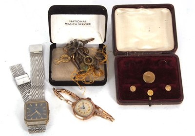 Lot 253 - Mixed Lot: A 9ct gold cased lady's watch on a...