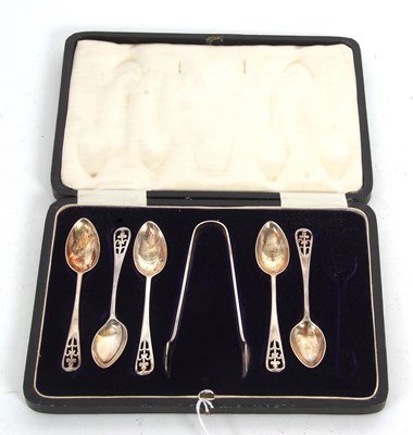Lot 186 - A part cased silver tongs and five teaspoons,...