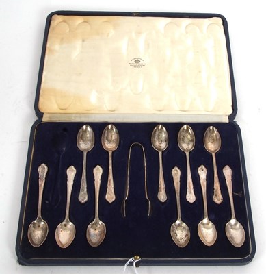 Lot 187 - A part cased set of George VI silver tongs and...