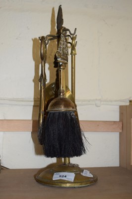 Lot 524 - BRASS FIRE COMPANION SET