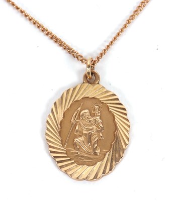 Lot 132 - A 9ct St Christopher and chain, the 9ct oval...