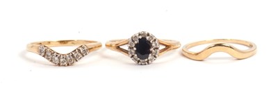 Lot 9 - A set of three 9ct rings, to include a...