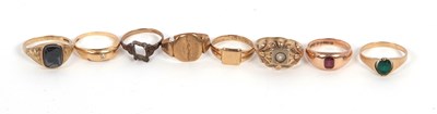 Lot 213 - Eight gold and gemset rings: to include a 9ct...