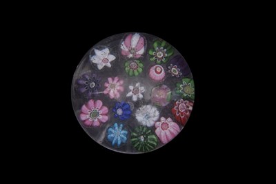 Lot 9 - Small paperweight with multi-coloured canes,...