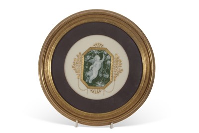 Lot 20 - Circular plaque, the centre modelled with a...