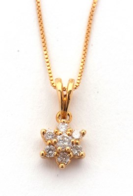 Lot 108 - A diamond cluster necklace, the flowerhead...