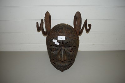 Lot 20 - AN UNUSUAL IRON FULL HEAD HELMET WITH PIERCED...