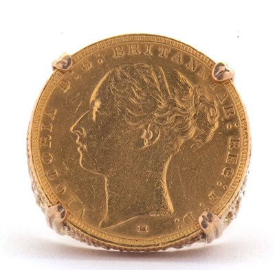 Lot 115 - A 9ct sovereign ring, the ring set with an...