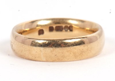 Lot 159 - A 9ct wedding band, hallmarked London 1988,...