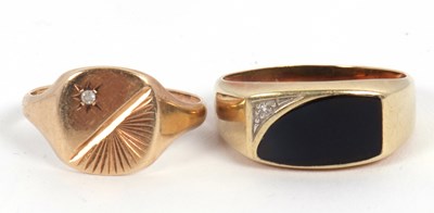 Lot 155 - Two gentlemans rings: to include a 9ct black...