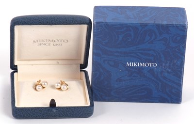 Lot 102 - A pair of cultured pearl earstuds, set with...