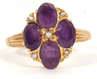 Lot 28 - An 18ct amethyst and seed pearl ring, the four...