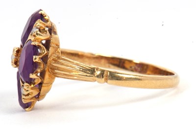 Lot 28 - An 18ct amethyst and seed pearl ring, the four...