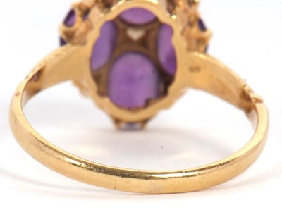 Lot 28 - An 18ct amethyst and seed pearl ring, the four...