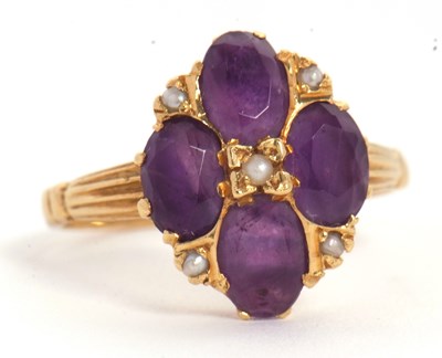 Lot 28 - An 18ct amethyst and seed pearl ring, the four...