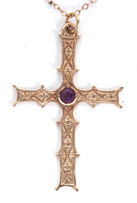 Lot 103 - A 9ct amethyst cross and chain, the cross...