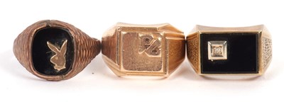 Lot 154 - Three gentleman's rings: to include one with...