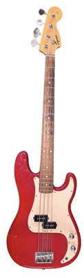 Lot 150 - A Fender Squier 4-string bass guitar in red...
