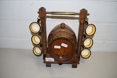 Lot 114 - SMALL OAK SPIRIT VALVE AND CUP