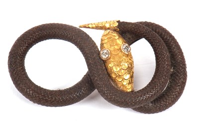 Lot 85 - A 19th century hairwork and diamond brooch,...