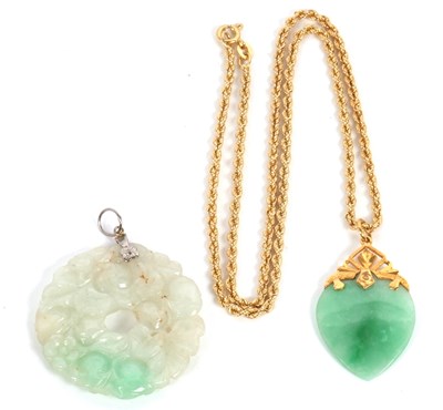 Lot 117 - A rope twist necklace and two jade pendants:...