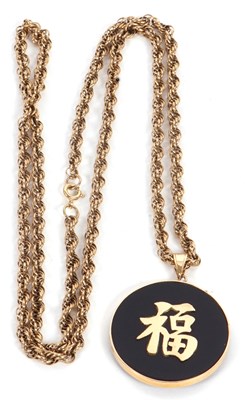 Lot 135 - A rope twist necklace and Chinese character...