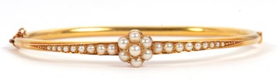 Lot 81 - A late 19th/early 20th century split pearl...