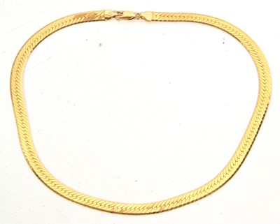 Lot 121 - A 14ct gold necklace, the flat herringbone...