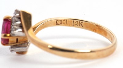 Lot 38 - A ruby and diamond ring, the oval ruby set...