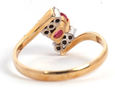 Lot 38 - A ruby and diamond ring, the oval ruby set...