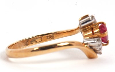 Lot 38 - A ruby and diamond ring, the oval ruby set...
