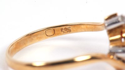 Lot 38 - A ruby and diamond ring, the oval ruby set...