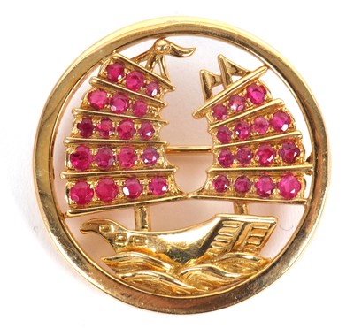 Lot 79 - A ruby set Hong Kong-Chinese junk brooch, the...
