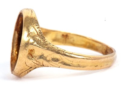 Lot 16 - A hardstone signet ring, set with a carnelian...