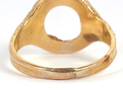 Lot 16 - A hardstone signet ring, set with a carnelian...