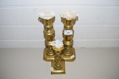 Lot 181 - THREE BRASS CANDLESTICKS