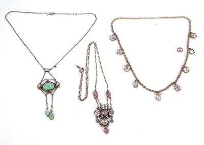 Lot 203 - Three gemset necklaces: to include an early...
