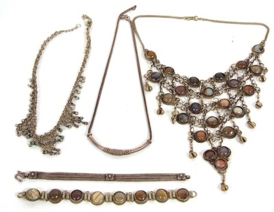 Lot 219 - A quantity of Eastern white metal jewellery:...