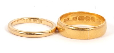 Lot 180 - Two gold rings: to include a 22ct wedding band...