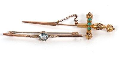 Lot 186 - Two brooches: to include an aquamarine and...