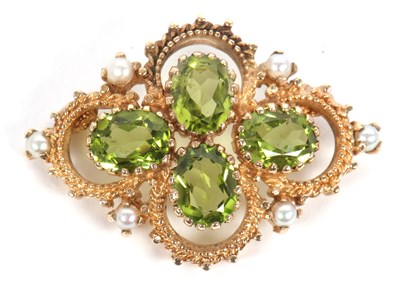 Lot 107 - A peridot and seed pearl brooch, set with four...