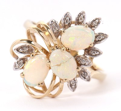 Lot 23 - A 9ct opal and diamond floral cluster ring,...