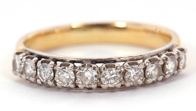 Lot 40 - A ten stone diamond ring, set with round...