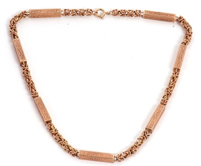 Lot 112 - A rose gold chain, comprised of oblong links...