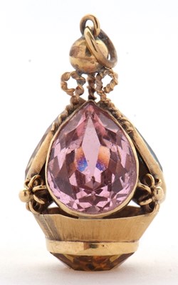 Lot 100 - A modern gemset fob/pendant, set with four...