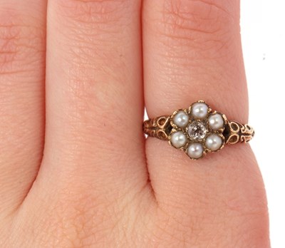 Lot 42 - A 9ct split pearl and diamond ring, the...