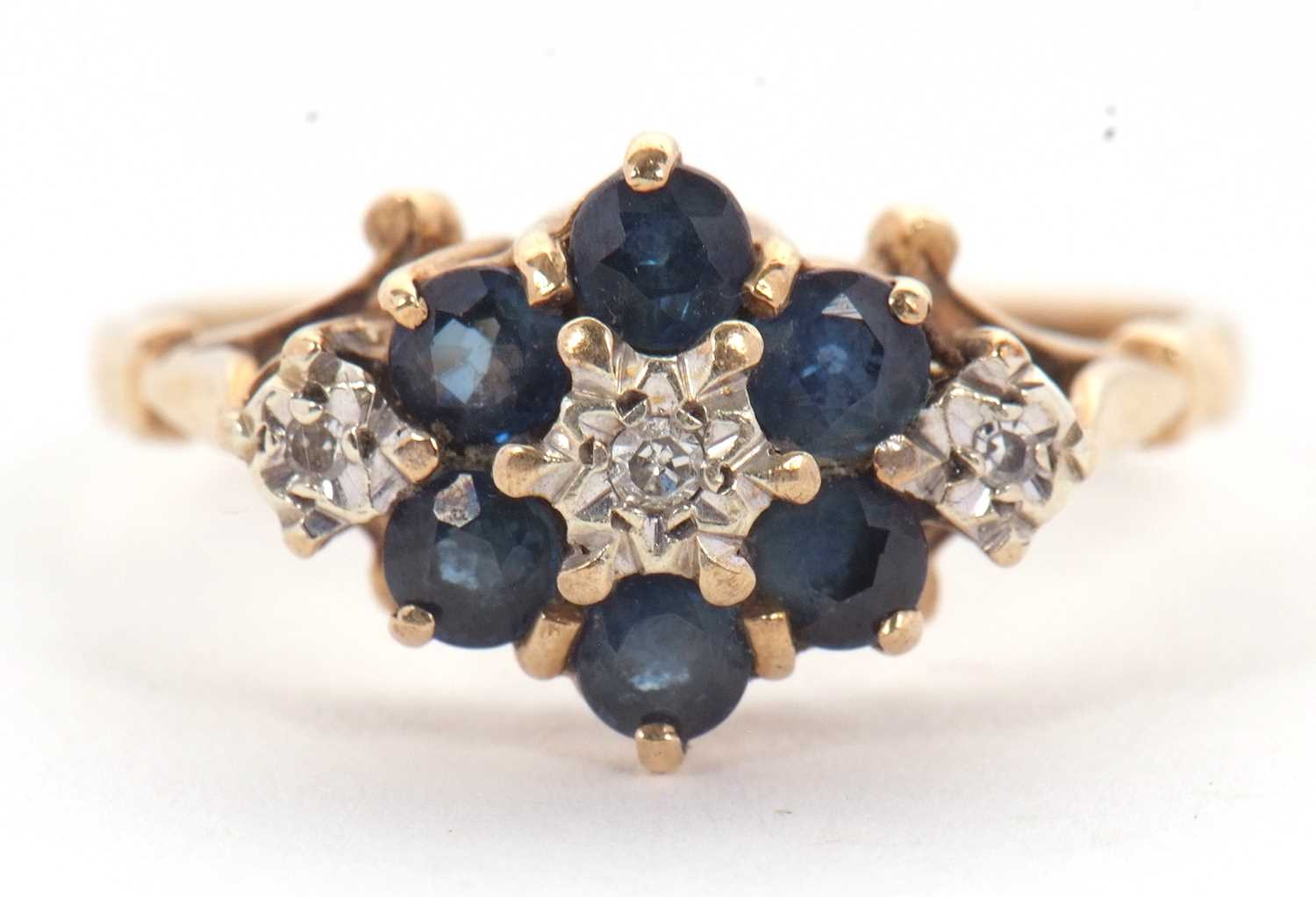 Lot 47 - A 9ct sapphire and diamond ring, with a...