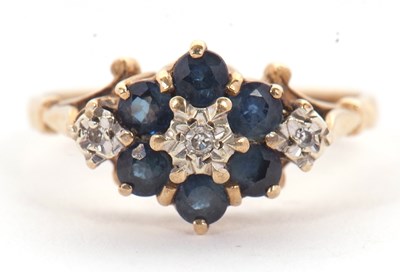 Lot 47 - A 9ct sapphire and diamond ring, with a...