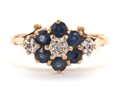 Lot 47 - A 9ct sapphire and diamond ring, with a...